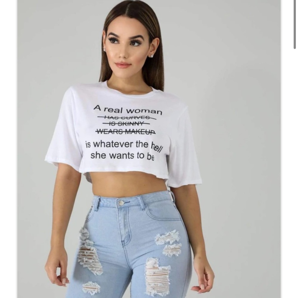 Women’s Empowerment White Crop Top Self-Love Statement Tee “A Real Woman Is…”